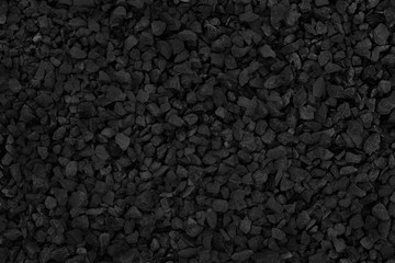 Natural stone pattern for background, black and grey stone gravel texture.