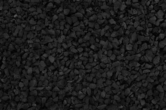 Natural stone pattern for background, black and grey stone gravel texture.