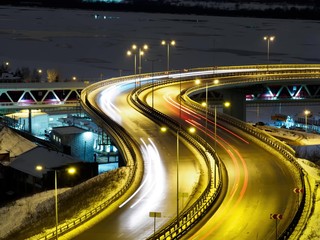 Fototapeta na wymiar Timelapse view on night city traffic