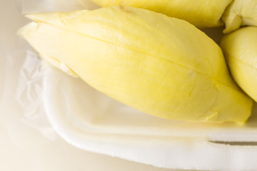 Close up of peeled durian. Close up of peeled durian flesh isolated on white background.