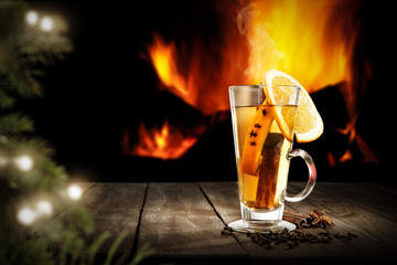 Christmas mulled on table and fireplace 