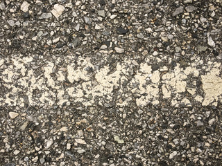 white lines on an asphalt road-narrow depth of field