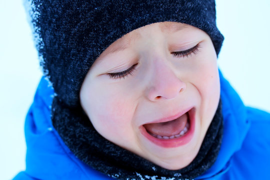 child is crying in the Winter, little boy, crying, upset