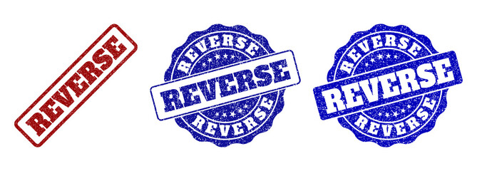 REVERSE grunge stamp seals in red and blue colors. Vector REVERSE labels with draft effect. Graphic elements are rounded rectangles, rosettes, circles and text tags.