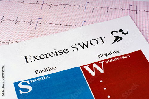 exercise swot form sheet stethoscope on ekg graph paper background ekg graph paper