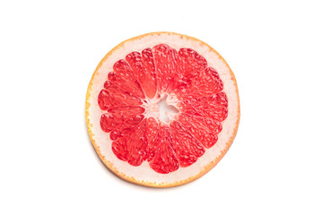 Single round sliced grapefruit, isolated on white background