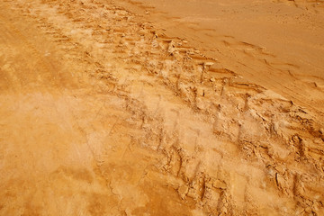 Tire tracks on the sand