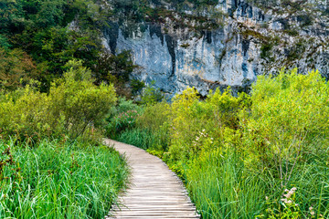 Wooden pathway above water at Plitvice National Park in Croatia