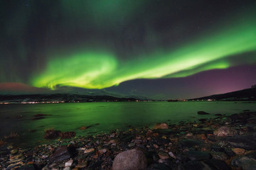 Fototapeta na wymiar The polar arctic Northern lights aurora borealis sky star in Norway Svalbard in Longyearbyen city mountains