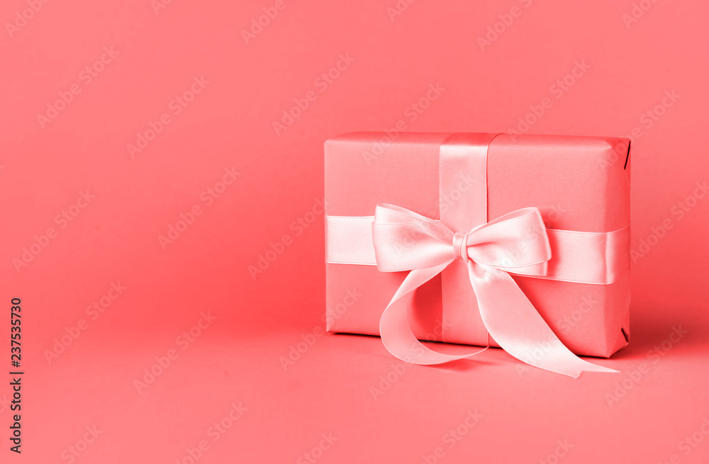 Canvas Prints Gift or present box on living coral colour background.