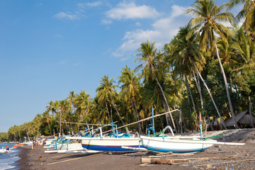 Fishing boats on the shore. Coast of Bali.