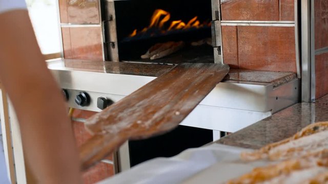 A man prepares delicious traditional Turkish cakes Pida. 4k