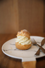 choux cream on wooden table