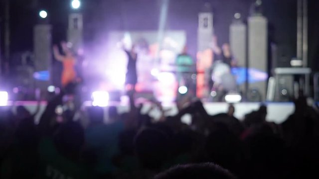 Blured Video Background Happy Audience Jumping Raising Their Hands Air Rock Group Concert Audience Raises Hands Up Applauds in the Rhythm Music Silhouettes Hands Concert Hall Musicians Perform Stage
