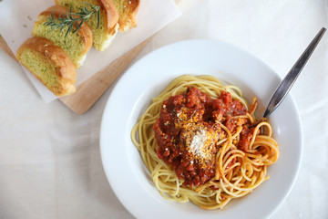 Spaghetti bolognese tomato sauce with bread , italian food