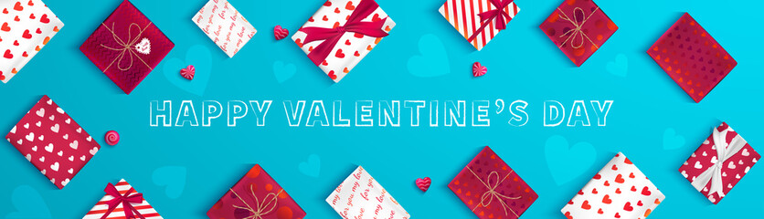 Happy Valentine's Day greeting banner. Top view on gift boxes in different packaging, candy in the form of heart. Vector web illustration background.