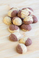 Cinnamon sandbakelse christmas cookies, two color, cocoa dark brown and vanilla light golden brown, delicious czech cookies