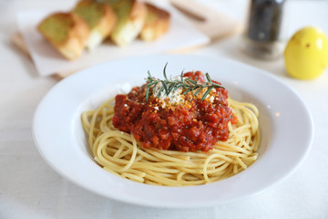 Spaghetti bolognese tomato sauce with bread , italian food