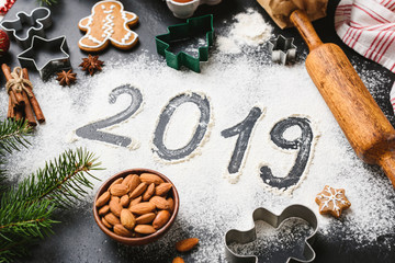 2019 New Year greeting written on flour. Winter holidays still life composition