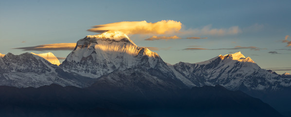 Beautiful panorama of Dhaulagiri and clouds during sunrise from Poonhill, Himalayas