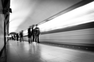 Moving train in the subway. Train silhouette in black and white. Moving train.