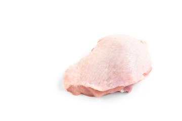 Raw chicken thigh isolated on white background.