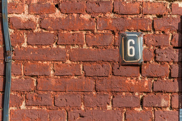 Fototapeta na wymiar brick wall with hole