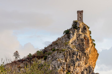The Upezzinghi tower in Caprona against a dramatic sky, Pisa, Tuscany, Italy
