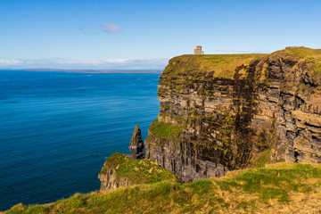 Magnificent rugged cliffs facing the mighty ocean landscape. Cliffs of Moher, Ireland’s most spectacular natural wonder at the heart of the Wild Atlantic Way, County Clare.