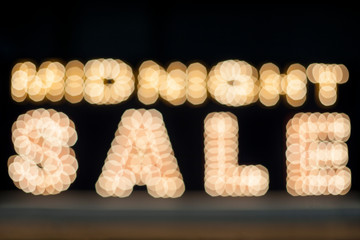 Midnight sale background. Brightly colored vintage advertising sign board with illumination