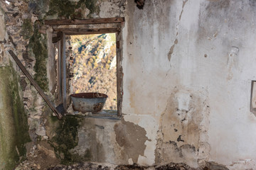 Ancient Metal Bowl in a Window in an Abandoned House in Southern Italy