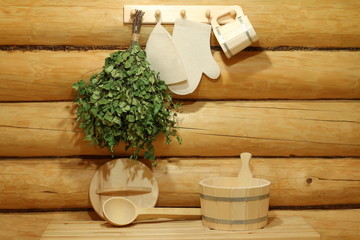 The traditional sauna and bath accessories in the interior of the sauna.