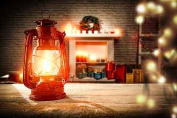Fototapeta na wymiar Christmas lamp on desk and home interior 