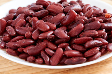 cooked kidney beans on a wood background