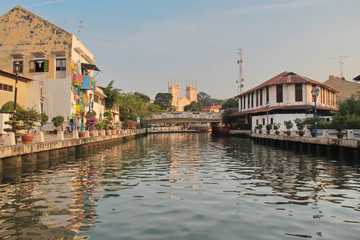 The Malacca River (Sungai Melaka) flowing through the old town of Melaka, Malaysia