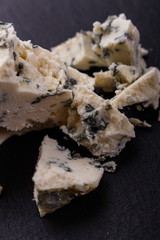 delicious blue cheese on wooden rustic background