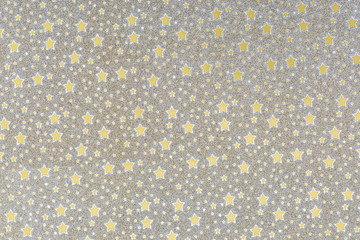 Background of stars in shades of gold and gold. Very Christmas.