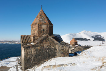 Scenic view of an old Sevanavank church in Sevan, on sunny winter day . Armenia