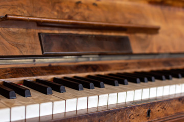 Fototapeta na wymiar Keyboard of piano. Selective focus image. Warm color toned music background