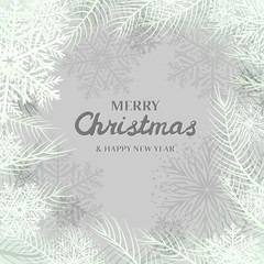 snowflakes and white spruce branches on gray background. Merry Christmas Greetings card