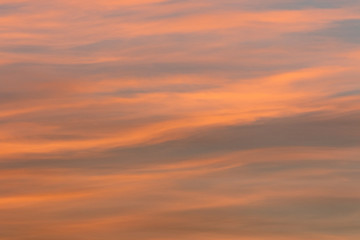 Colorful gentle clouds in sunset time. Like brush strokes.