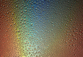 backgrounds are multicolored, water on the glass