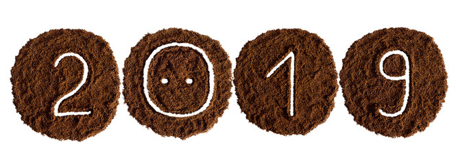 2019 decorated with ground coffee on white background