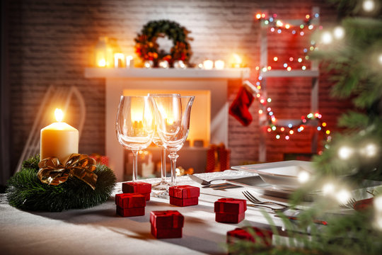 Table background with fireplace and christmas tree 