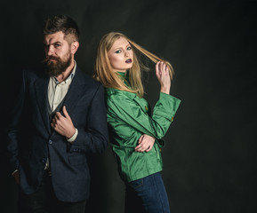 Enjoying friendly relations. Couple in love in fashionable style. Love relations. Autumn fashion trends. Fashion couple of sexy woman and bearded man. Autumn street style. The joy of best look