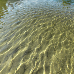 Fototapeta na wymiar Reflective Wenatchee River in Leavenworth WA day