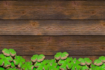 base panels wooden dark brown boards horizontal background border band set gingerbread mastic green clover symbol holiday day saint Patrick invitation poster