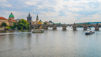 View of the Old Town pier architecture and Charles Bridge over Vltava river in Prague, Czech Republic