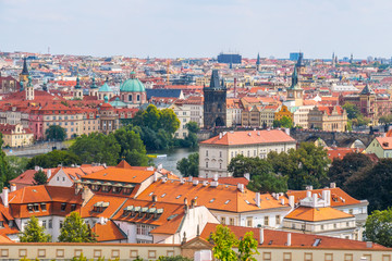 Fototapeta premium View over historic center of Prague with castle Prague city panorama, red roofs of Prague, Czech Republic