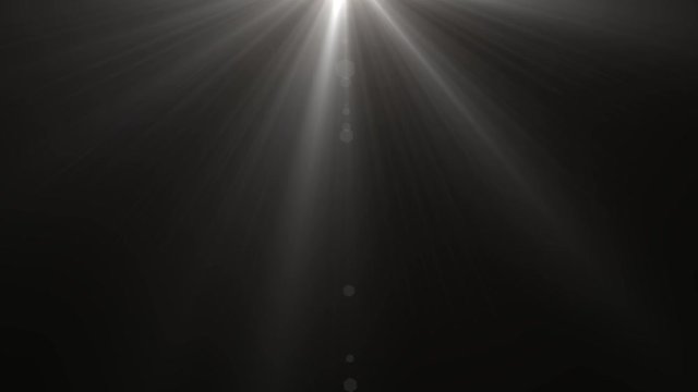 Isolated white light rays animation. Shine or sun effect on black screen. Glitter, shiny, bright, flare footage.